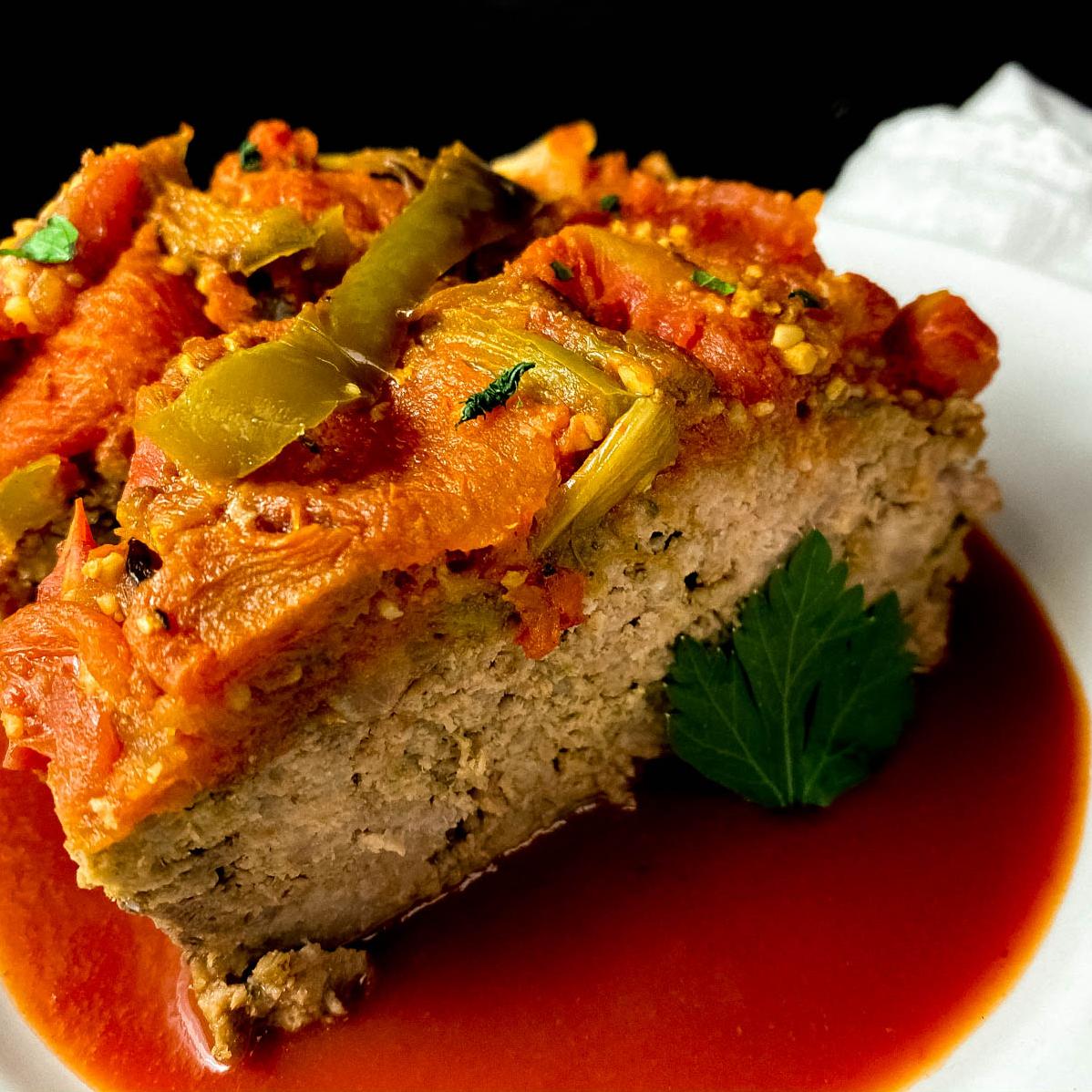  A slice of delicious Creole Meatloaf, perfect for a cozy family dinner