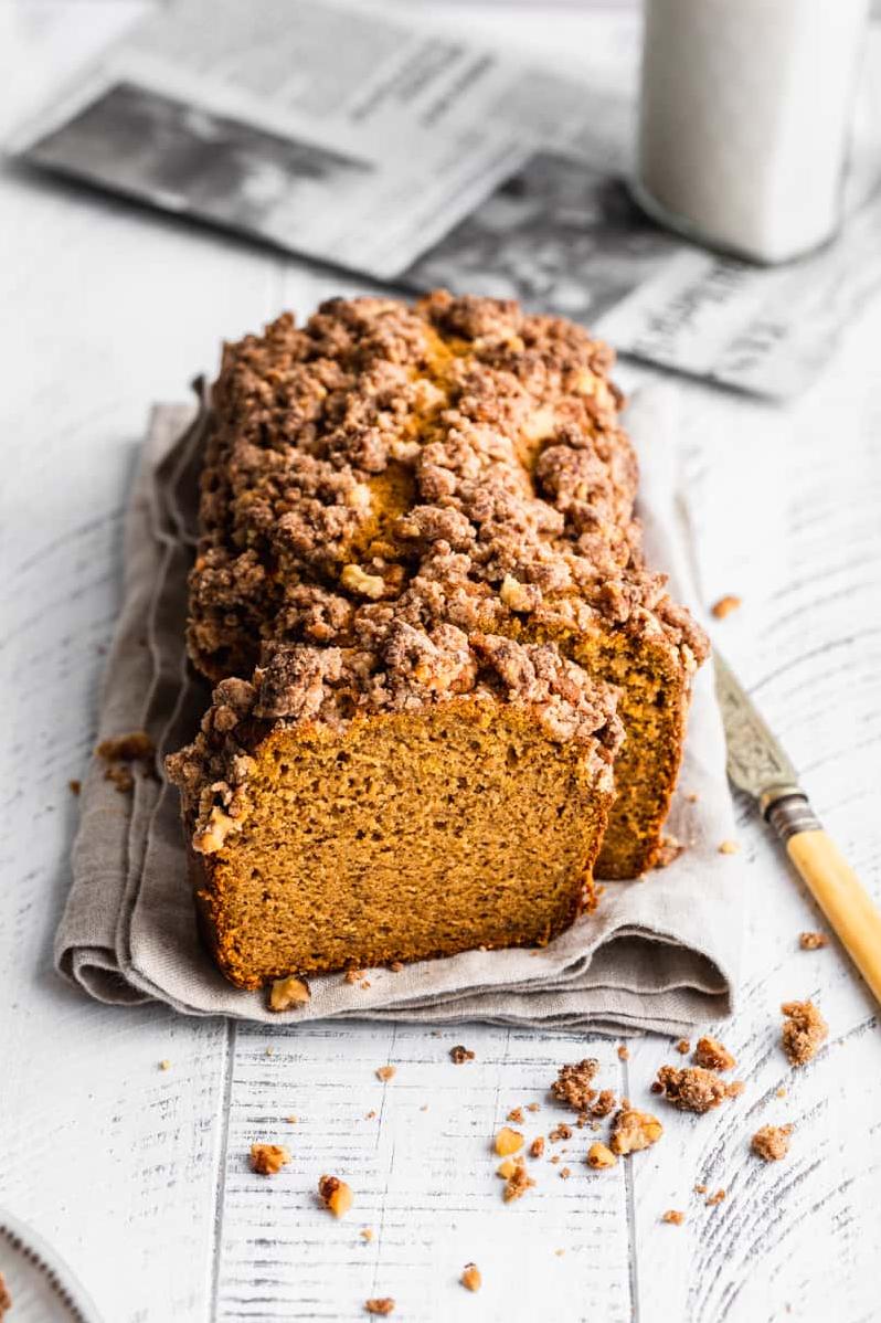  A slice of warm, gluten-free pumpkin banana bread straight from the oven.
