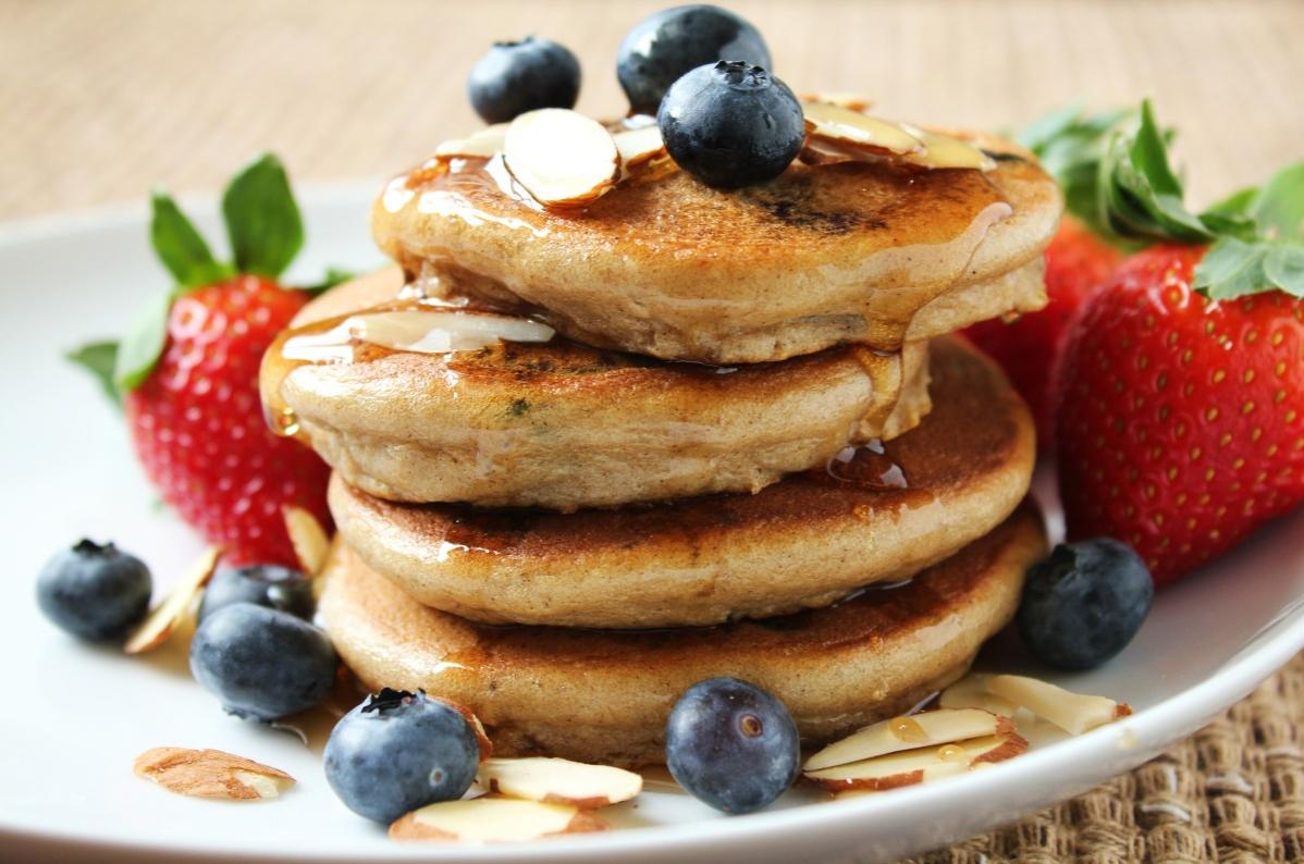  A stack of fluffy gluten-free silver dollar pancakes ready to be devoured!