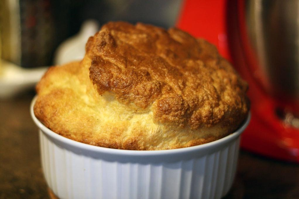  Behold, the perfectly risen and beautifully golden cheddar soufflé!