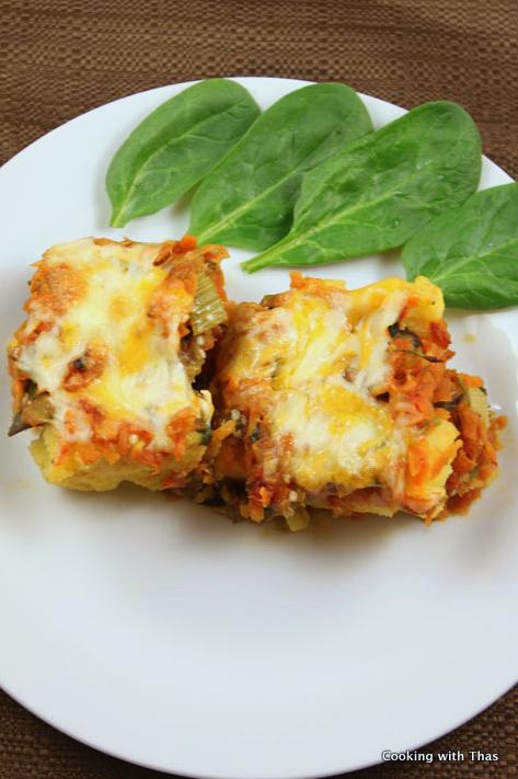  Cutting into this lasagna is a satisfying experience, revealing a beautiful array of colors and ingredients.
