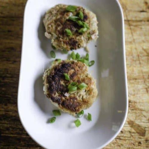  Dive into a healthier meal option with these gluten-free crab patties.