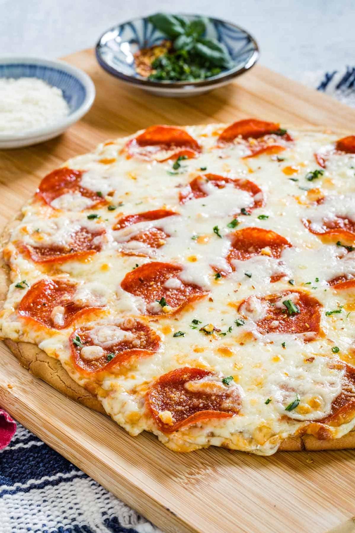  Each slice of this Pepperoni Pizza Pie is loaded with flavor and will have you coming back for seconds.
