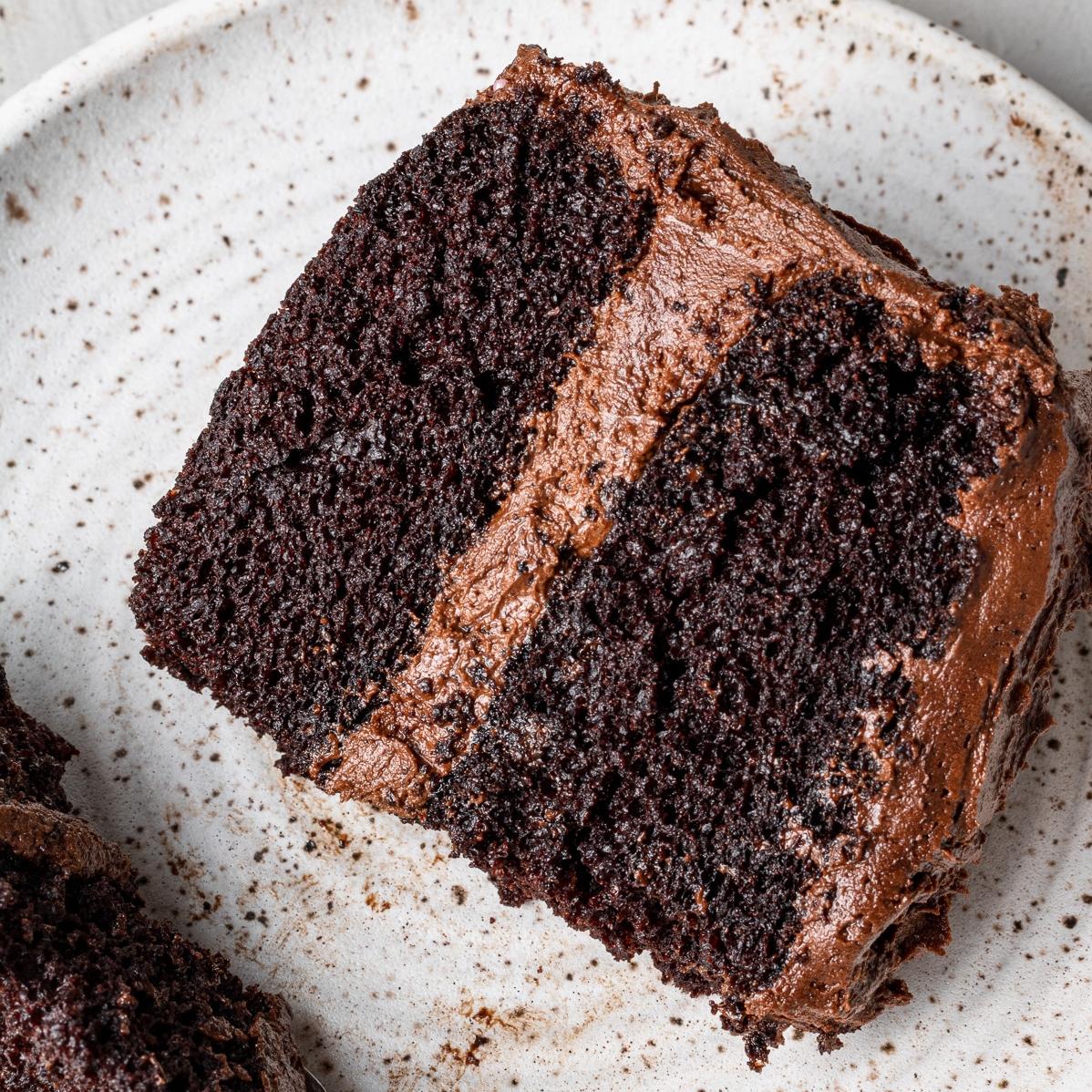  Indulge in a rich and decadent bite of our dairy-free chocolate cake!