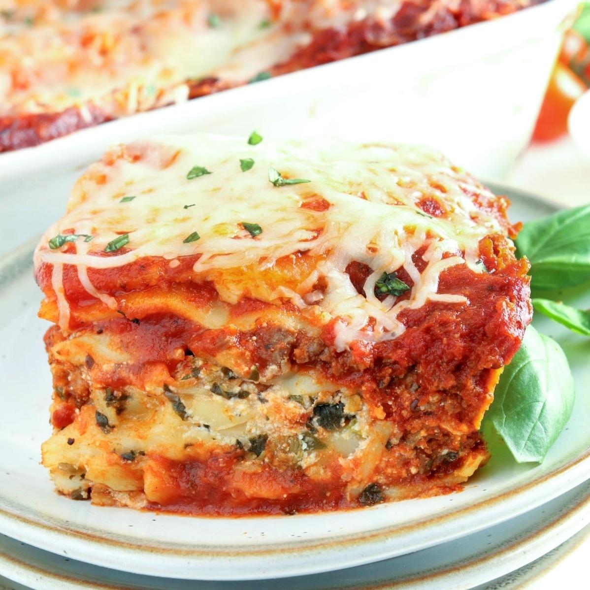  Layers of gluten-free lasagna noodles, seasoned ground meat, and colorful veggies make this dish a feast for the eyes and the taste buds.