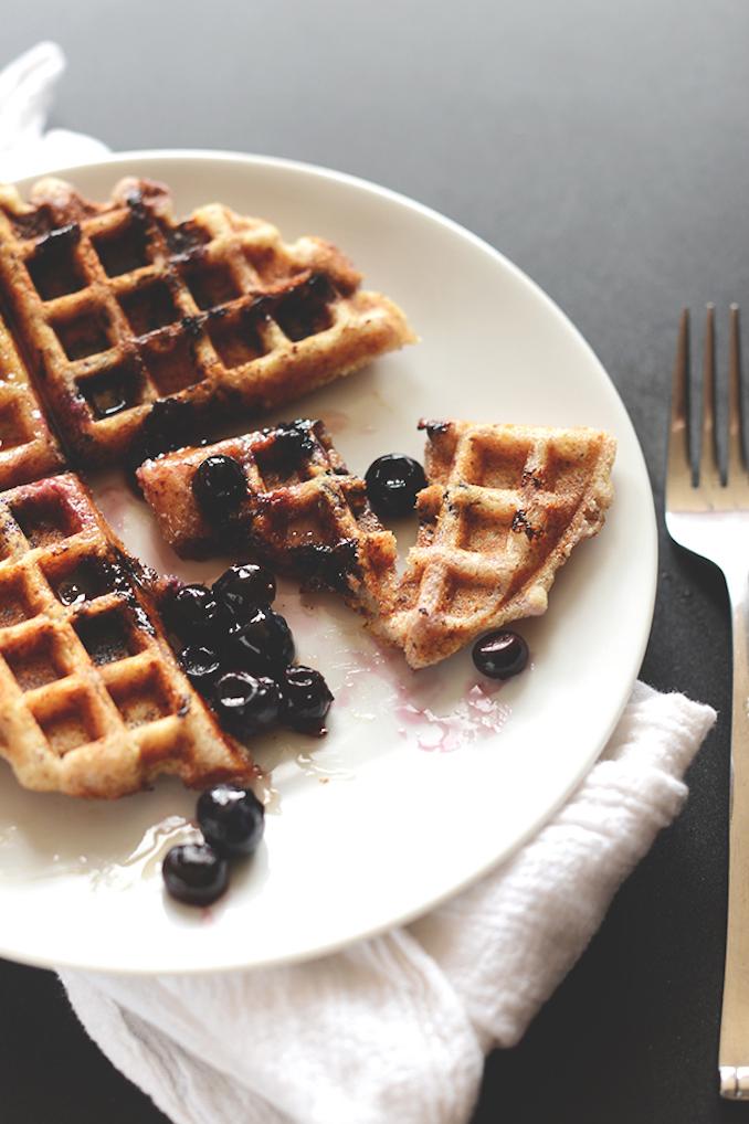  One bite of these Lemon Blueberry Waffles will transport you to a summer day at the blueberry fields.