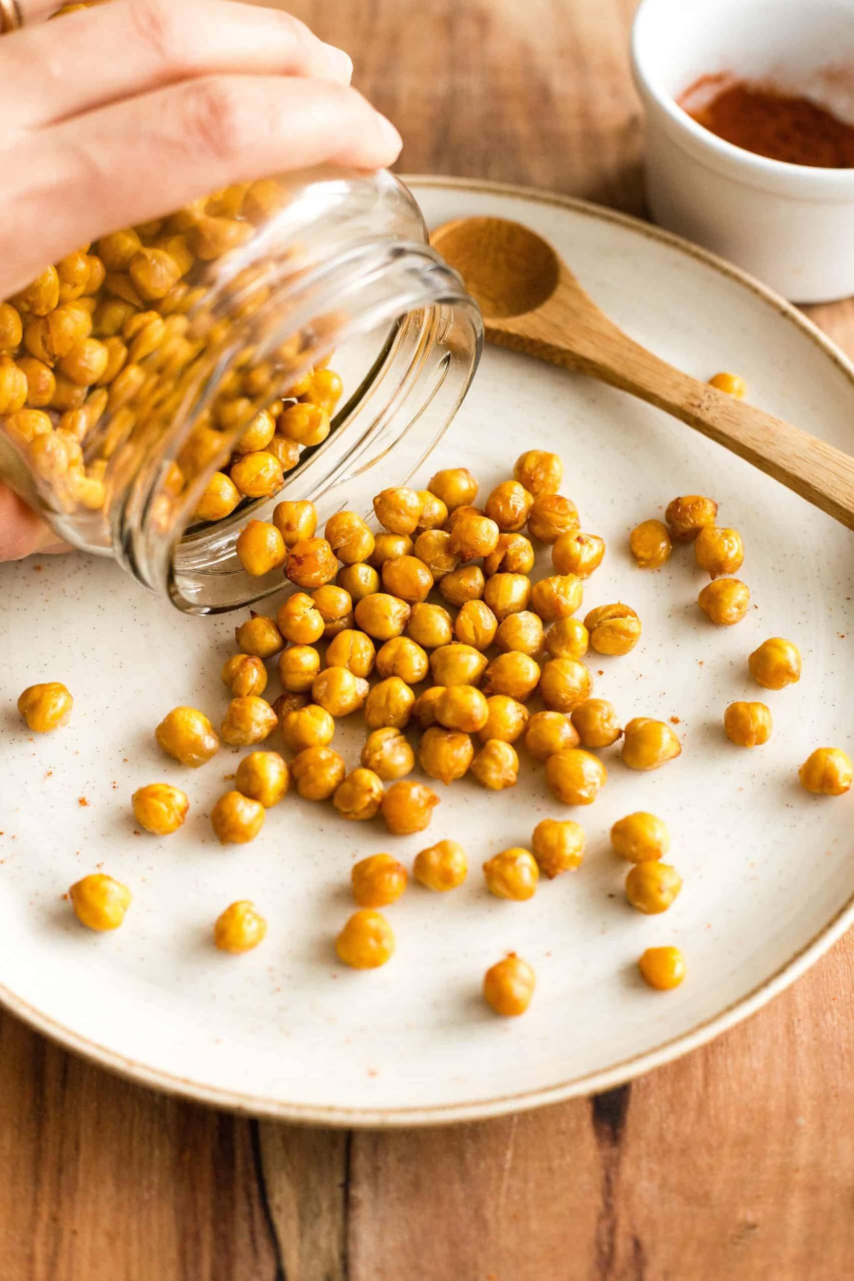  Say goodbye to boring snacks and hello to the perfect balance of salty and sweet with these baked chickpeas.