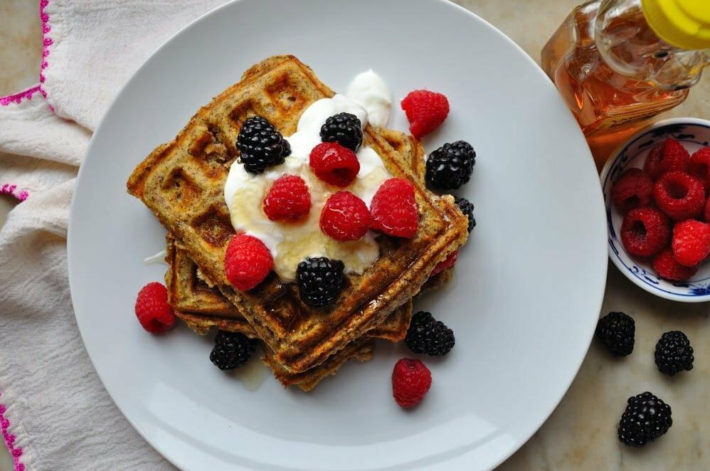  Served drizzled with honey and topped with fresh berries, these waffles make a heavenly breakfast