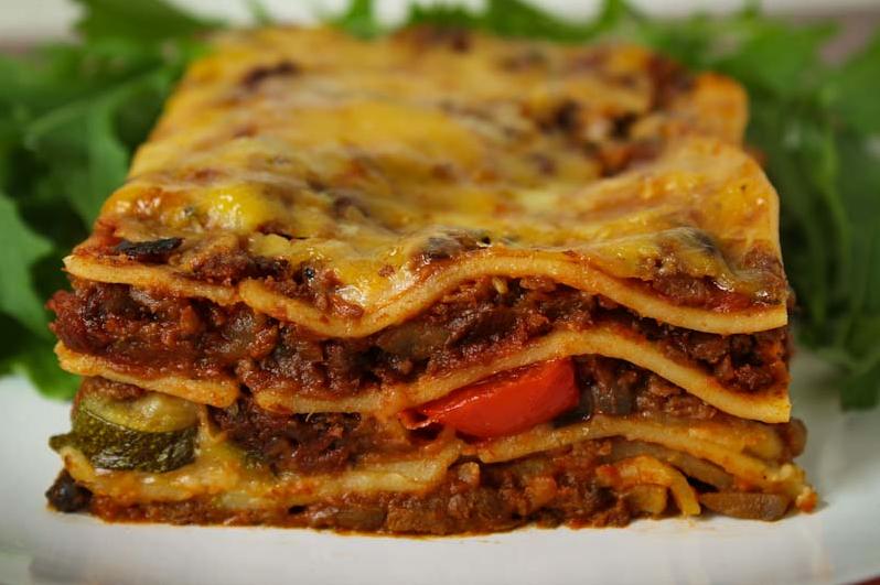  This hearty and healthy lasagna is perfect for those with specific dietary needs, omitting dairy and gluten without sacrificing flavor.