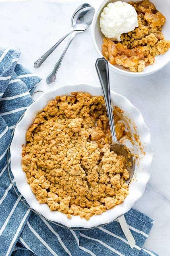  With a crisp and crunchy top made of pecans and oats, this dessert is a textural wonderland for your taste buds.